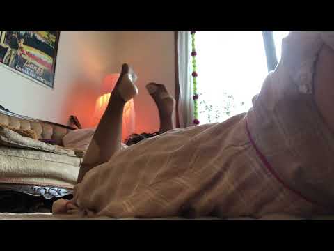 ASMR feet in the pose ripped fishnet stockings