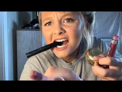 Doing your makeup fast and aggressive with mouth sounds (volume down)