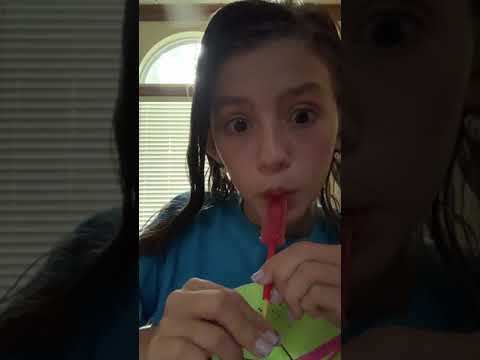 ASMR eating an edible mini whistle