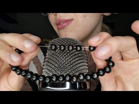 Tongue clicking and wooden bracelet, sound & visual triggers (no talking)
