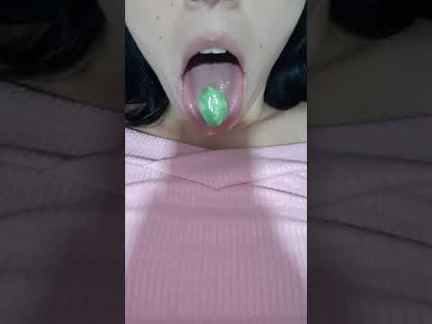 asmr mouth sounds, candy in the mouth, licking the lens.