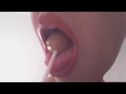 ASMR licking lollipop sucking candy