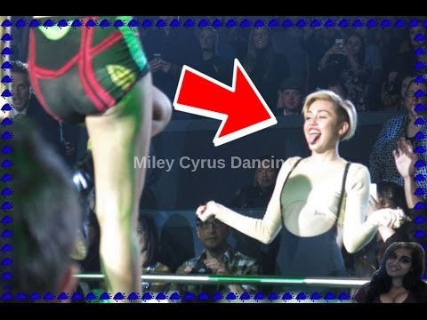 Miley Cyrus dancing to Britney Spears Live Performance  concert is cool !