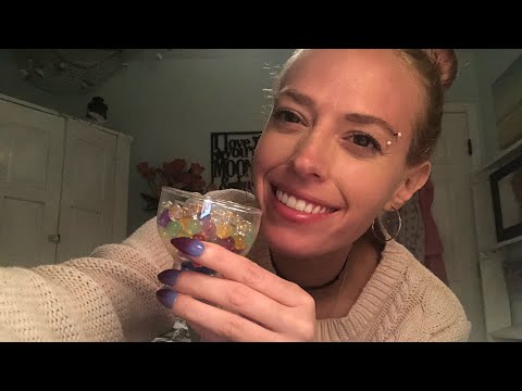 ASMR whispering and separating water beads/orbeez by color