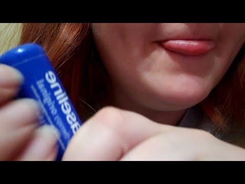 asmr applying chapstick with mouth sounds