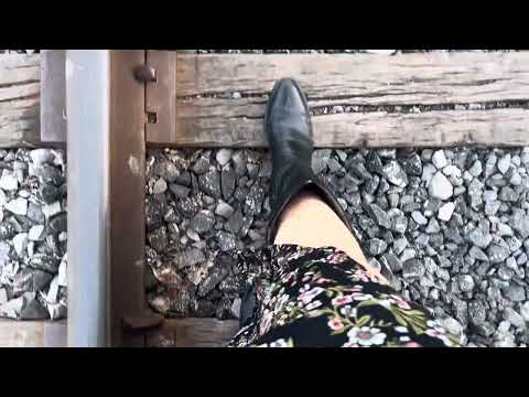 ASMR she's walking on train tracks in cowgirl boots cool sounds