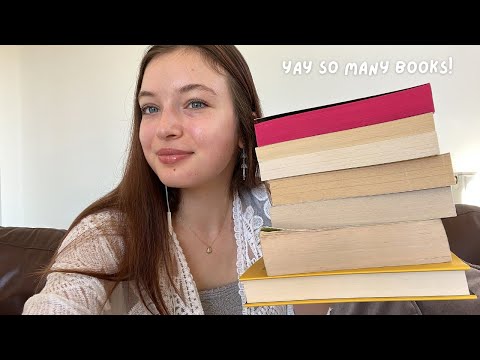 ASMR whispered book haul 📖🌷 (lots of tapping & page turning)