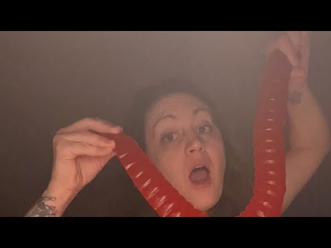 Eating a giant gummy worm!