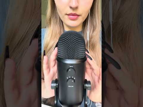 Bare mic scratching with long nails
