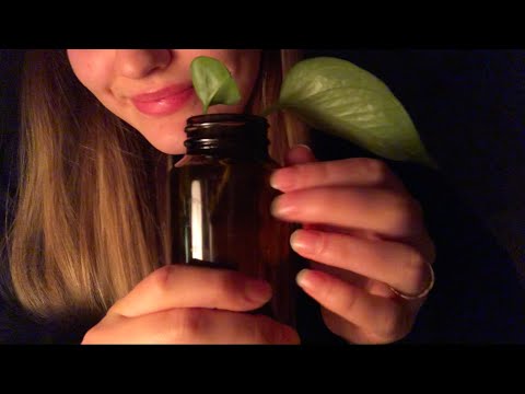 ASMR glass tapping and face brushing w/ some mouth sounds, whispers, & hand movements