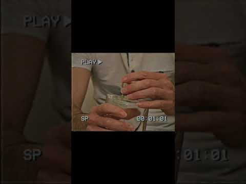 ASMR from the 1980s tapping a perfume bottle #short