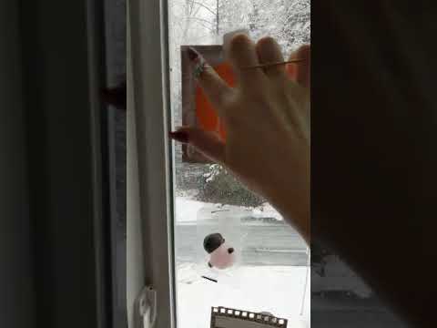 ASMR...But i taped items to a snowy window