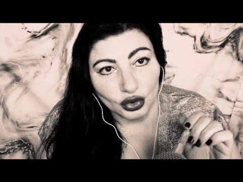 ASMR- crisp mouth sounds and rambling (inaudible) fast hand movements. Many triggers.