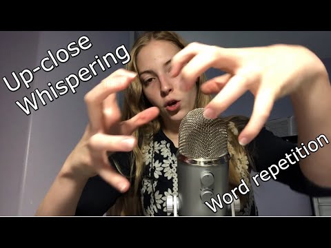 ASMR up-close whispering, word repetition