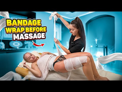 HOT BANDAGE WRAP BEFORE ANTI-CELLULITE MASSAGE FOR A BEAUTIFUL WOMAN