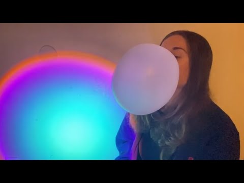 Blowing giant bubble gum bubbles with a whole roll of bubble tape