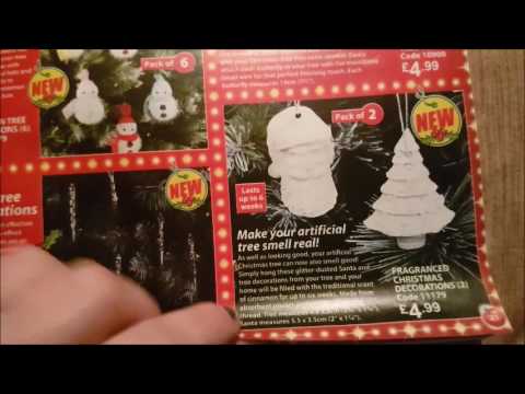 Asmr Whispering and looking through a christmas themed magazine - Page turning sounds