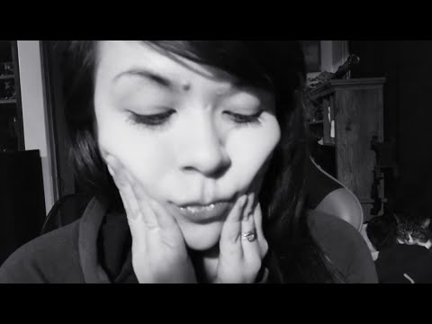 (( ASMR )) up close mouth sounds with periodic hand movements.