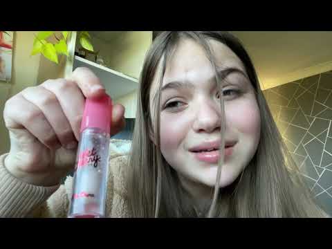 ASMR haul! ( tapping,mouth sounds , lip gloss application )
