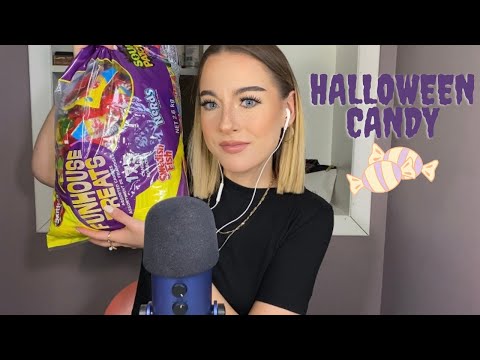 ASMR | over explaining halloween candy (wrapper crinkles, eating, whispering etc.)