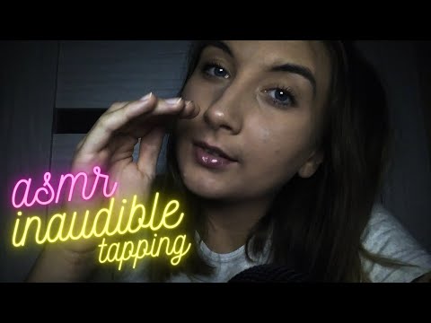 ASMR| inaudible whispering with tapping (mouth sounds)