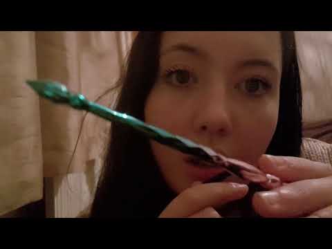 Brushing your face and whispering trigger words | ASMR by Emma