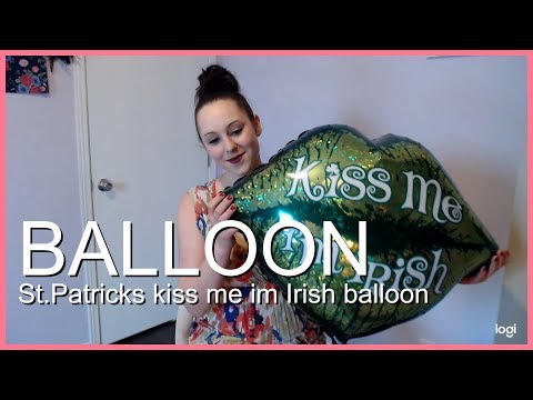 Blowing up Mylar Balloon-kiss me im Irish
