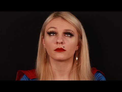 Supergirl Hypnotized by Emma Frost