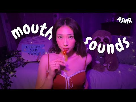 my first time trying mouth sounds 🍭 ASMR (with hand movements, lollipop eating, & spoolie nibbling)