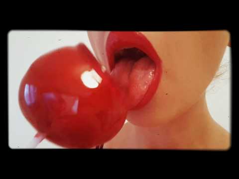 ASMR licking big red candy sucking