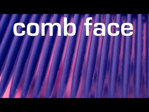 non binaural camera touching face combing and pointing. clicking.t, t, t, sounds