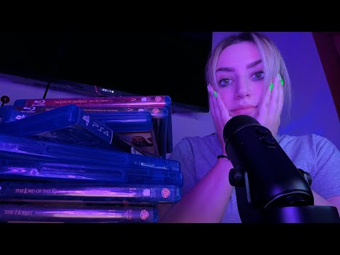 ASMR Tapping on my PS4 video game collection. (Whispering and tapping)
