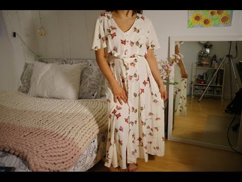 asmr altering a dress while ear-to-ear whispering