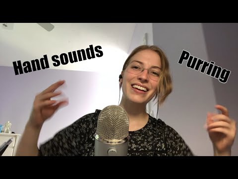 ASMR hand sounds, simulated purring, whispering