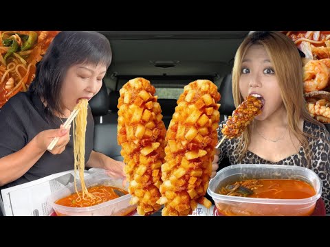 EATING SPICY SEAFOOD NOODLES & CORN DOGS in the car!