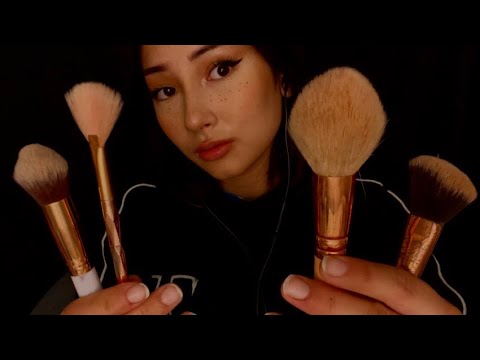 ASMR brushing your face and repeating trigger words