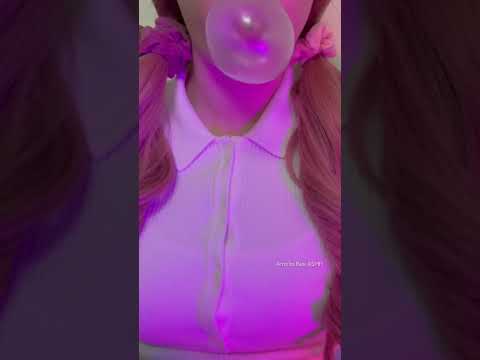 A girl blowing big bubble gum bubbles 😛
