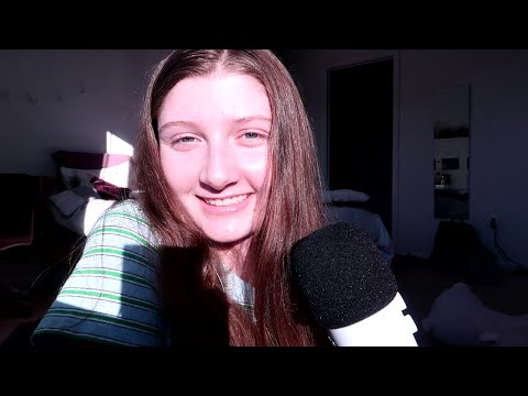 ASMR mouth sounds, tapping, hand movements, and whispering