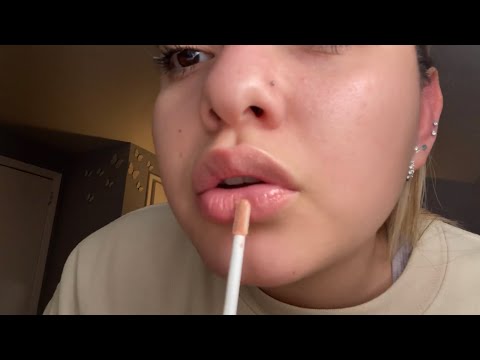 ASMR - annoyingly chewing gum while applying lipgloss