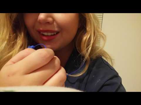 ASMR whispering and mouth clicking