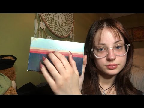 ASMR- tapping on eyeshadow pallets and the camera (whispered)