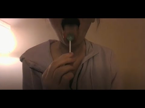 Eating a lollipop w/ camera covering and crumpling paper ASMR