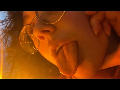 ASMR extremely close up lens licking with breaths and slurps (wet mouth sounds) (repeating “lick”)