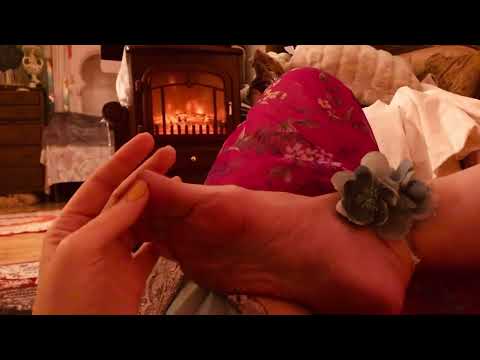 ASMR touching right foot gently by fire