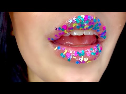 Glitterly lips licking and spit painting
