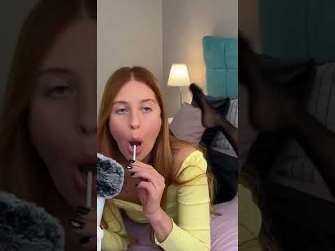 ASMR candy licking in the pose. Black tights. Mouth sounds. #tights #nylon #asmr