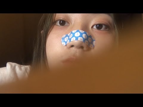 ASMR sticking band aids on you (and taking them off) | crinkling, taping sounds, camera tapping
